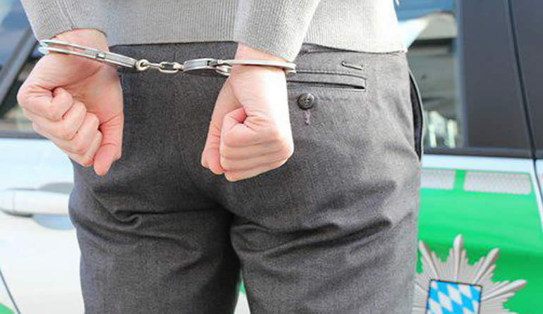 arrest, suspect in handcuffs